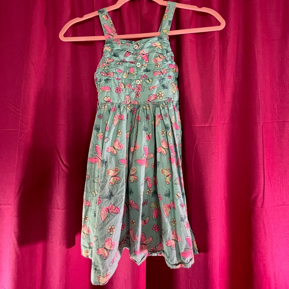 Cute teal butterfly dress. little kids size 7 with buttons.